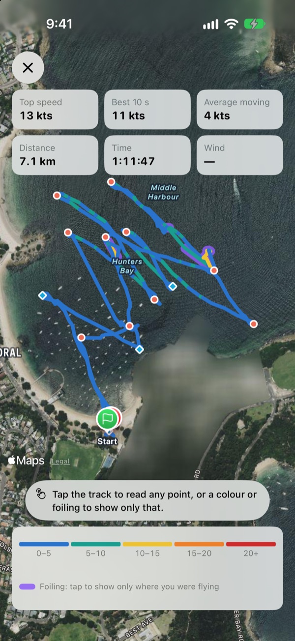 A windfoil session at Balmoral on the full-screen map: the track coloured by speed, gybes as coral dots, tacks as cyan diamonds, violet where the foil was flying, and top speed, best 10 seconds, distance and time along the top